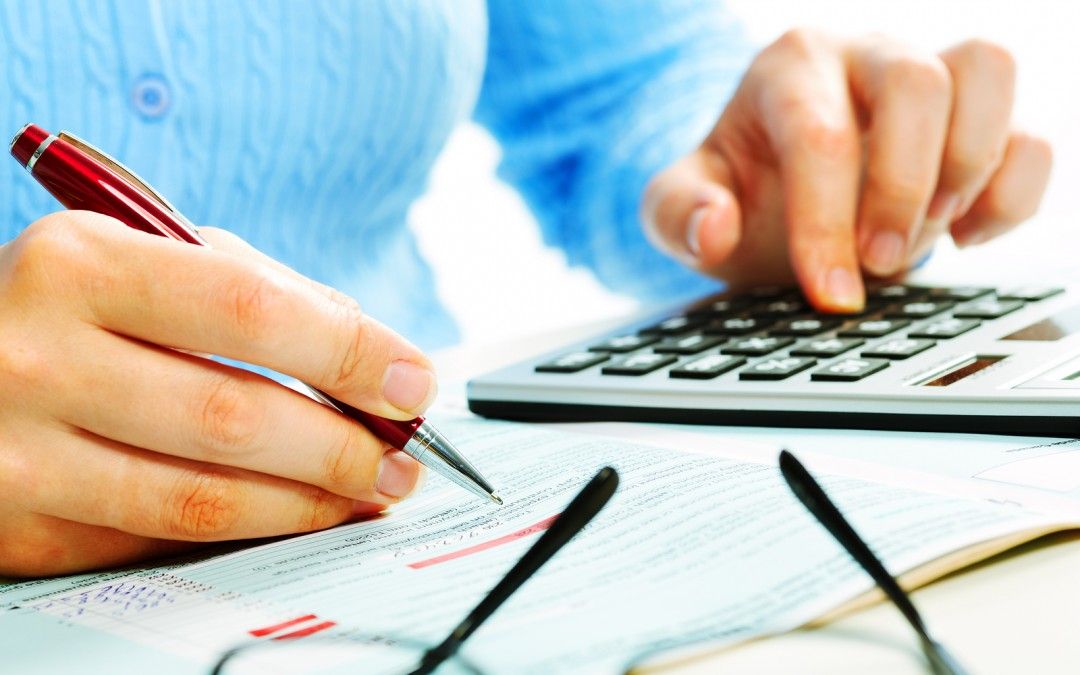 Financial Calculator Tax Female 1080x675 - Important Filing Update: New FBAR Deadline for 2016