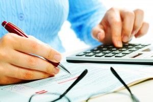 Financial Calculator Tax Female1 300x200 300x200 - US Taxes for Expats Living in Luxembourg